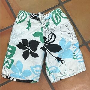 Charlie Rocket White Swim Shorts with Black, Blue & Green Tropical Print